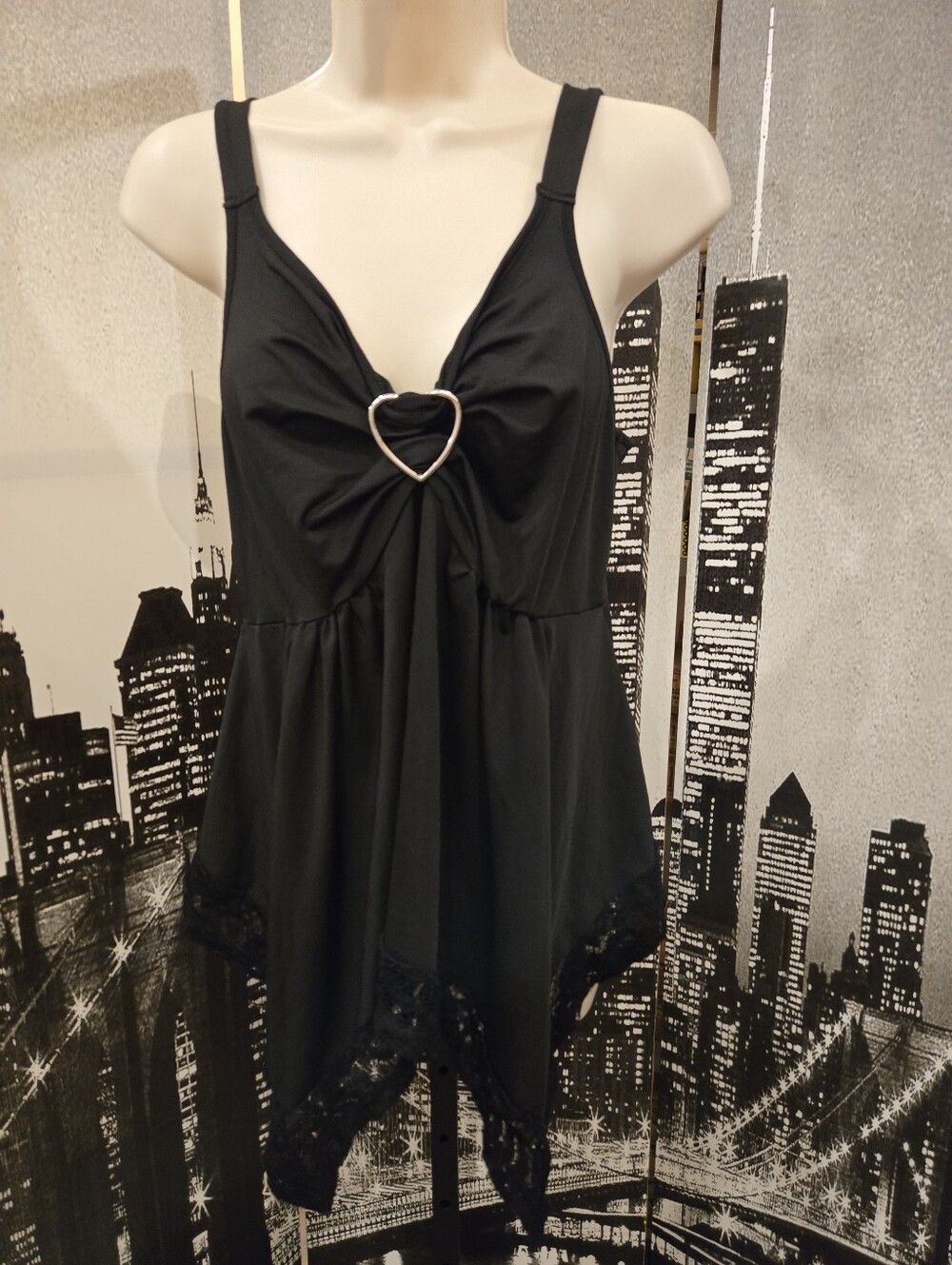Shein size XL black top with heart accent
